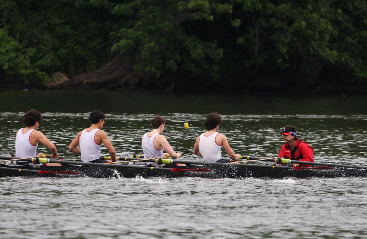 Sophomore coxswain James Millward coxing the 2V boat in the Stotesbury Cup Regatta. The boat placed 5th in time trials, advancing them to semi-finals. 