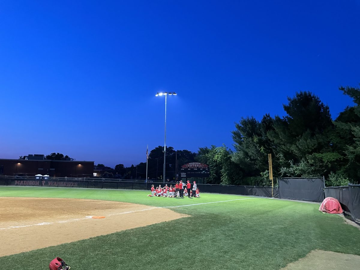 McLean softball reminisces after a close loss to Madison. The reigning state champions had high hopes, but they were unfortunately dashed with the 6-5 loss.