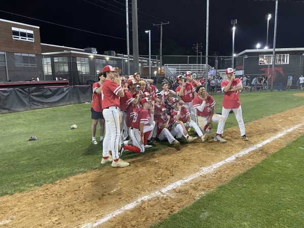 McLean varsity baseball celebrates after a dramatic 6-4 win against the Madison Warhawks. Their win ended an era of Warhawk dominance in Virginia after two state championships in three years.