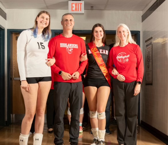 Long poses with her family on McLean volleyballs senior night. My favorite memory from volleyball was probably senior night this year, Long said. I had been a part of three senior nights up to that point and had always imagined what mine would be like. It was just a very full circle moment for me.