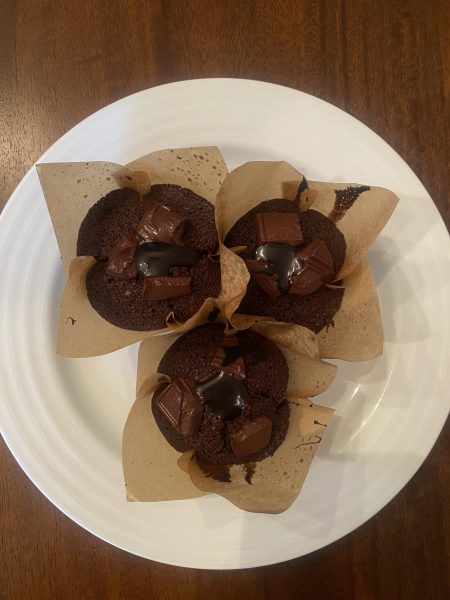 The double chocolate muffins filled with a chocolate ganache are fresh and warm out of the oven. This is the perfect dessert to get athletes ready to go for gold.