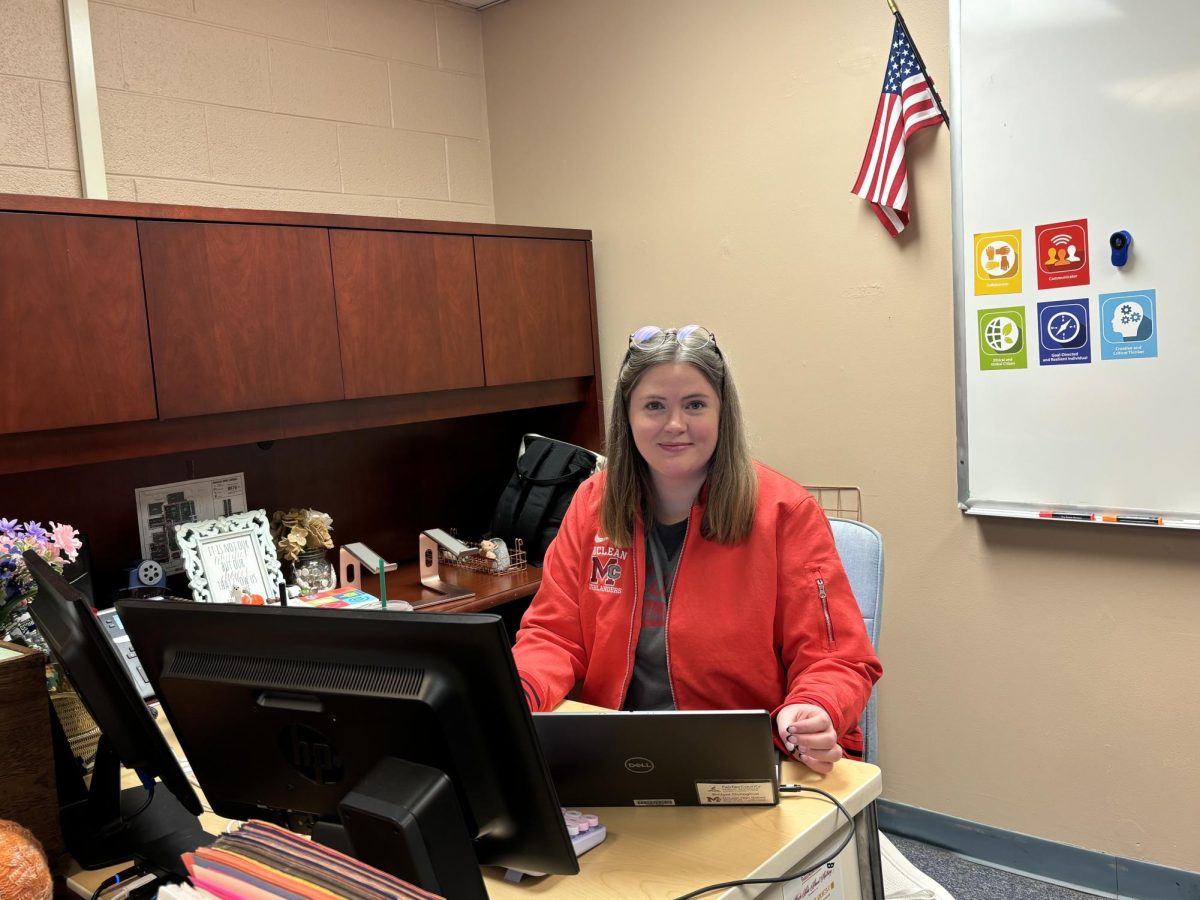 Donoghue types on her computer at her desk in the Blended Learning Center. She returned to the staff as a technology specialist in January  2024. 