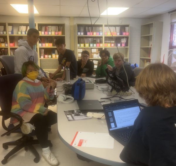 McLean's Quiz Bowl team prepares for upcoming tournaments at a meeting. Practice for tournaments consists of organized scrimmages that simulate matches with questions from past tournaments.