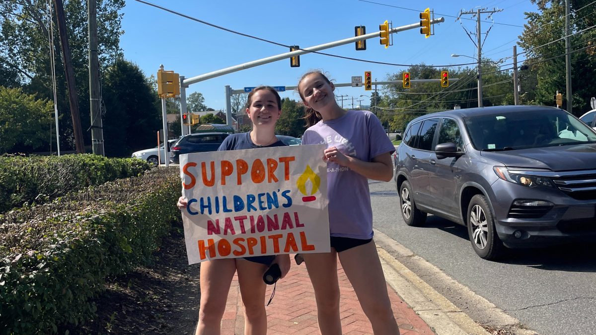 McDance-a-Thon members promote their car wash on Saturday, October 5th. All proceeds from the car wash go to Children's National Hospital, the club's main focus. 