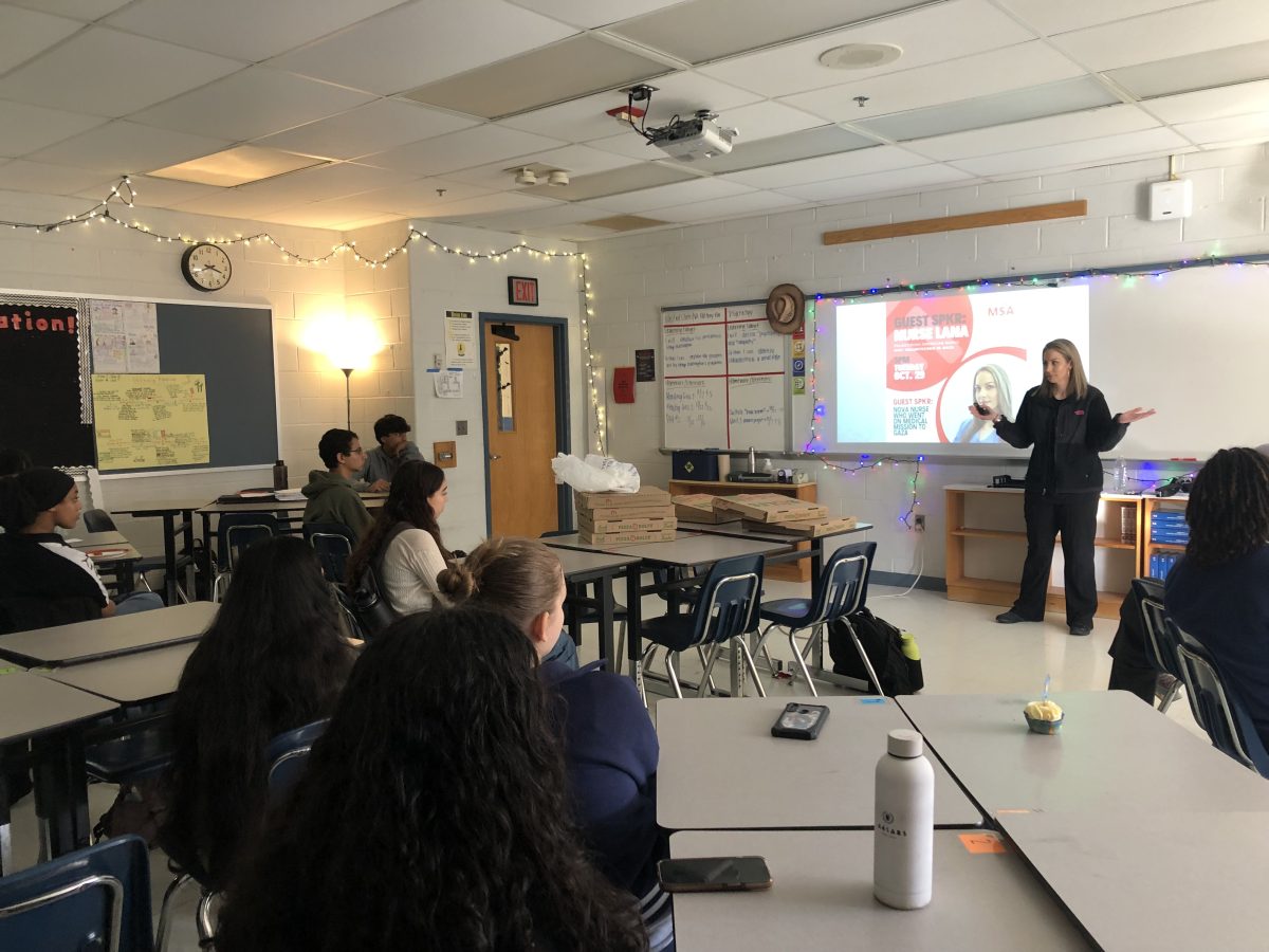 Students listen attentively while Lana describes her journey volunteering in the Gaza Strip. Lana proceeded to answer questions from students after the presentation.