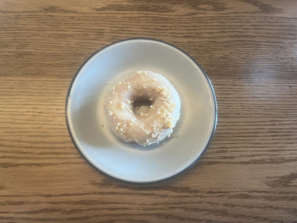 The donut was the most disappointing part of our meal, with a dry, bread-like texture that did not stand out next to other, more flavorful dishes. However, the lemon flavor from the icing was strong, offering a pleasant contrast to the rather lacking texture.