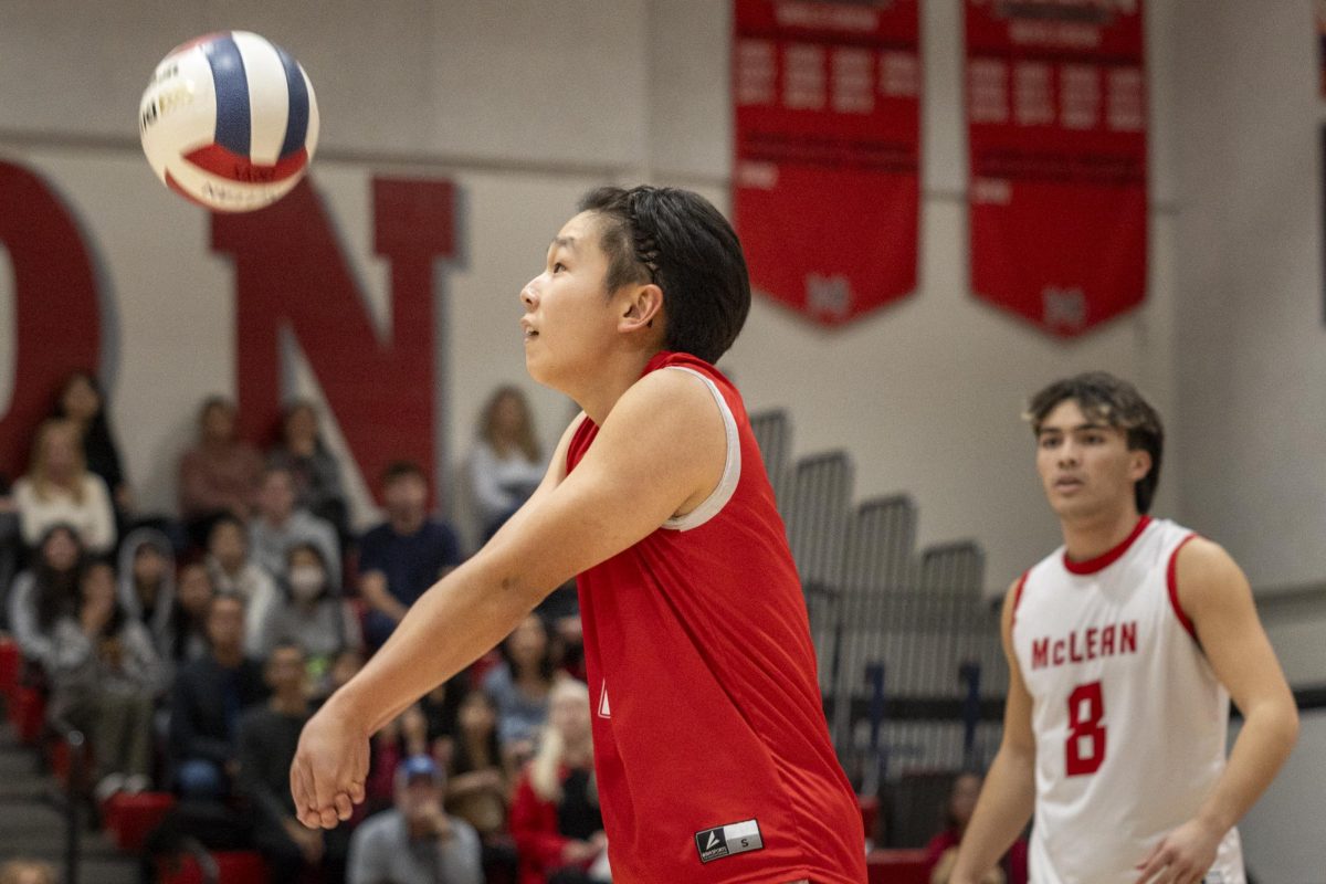 Senior Zachary Chung, Mclean's libero, bumps the ball. As a libero, Chung works as the main receiver of serves. 