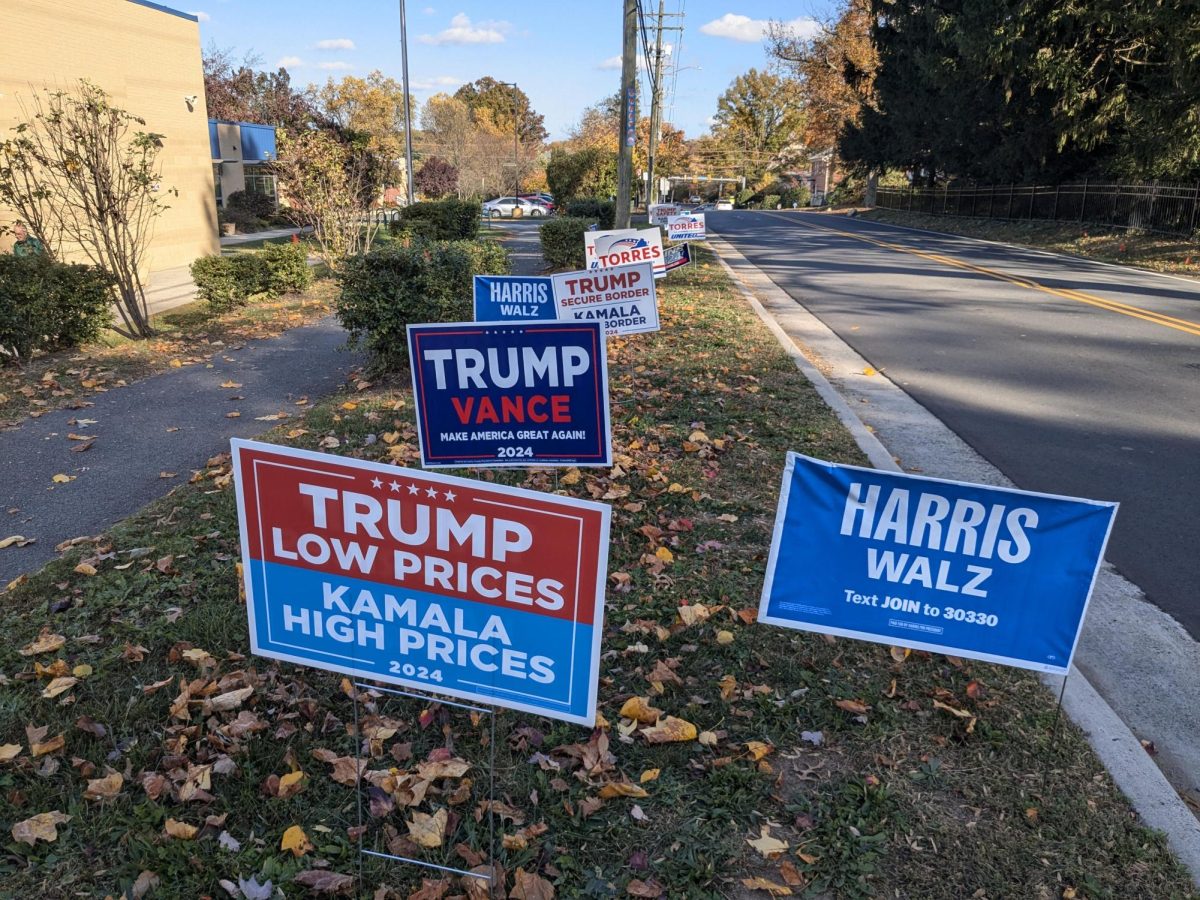 Campaign signs on the side of Haycock Elementary school, a polling station. 