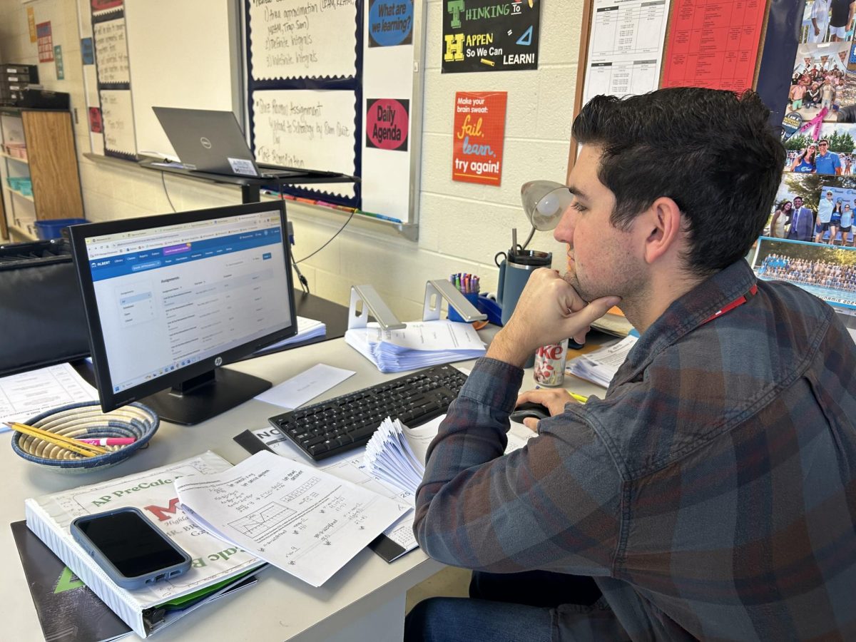 AP Calculus BC teacher Evan Brandt looks over remediation assignments in Albert.io. 