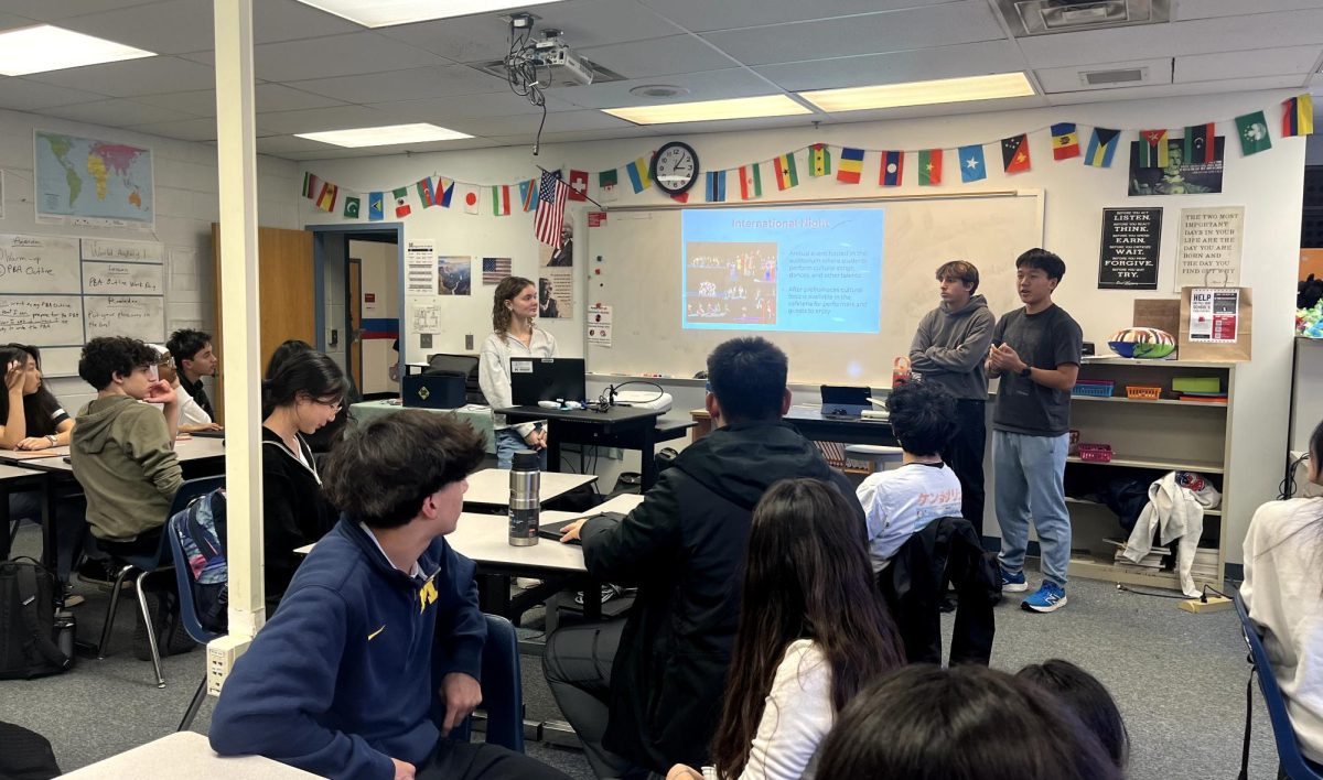 Students gather for the informative session on International Night. Performers and volunteers completed the sign-up afterwards.