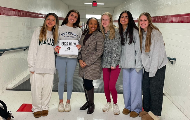 Kind Contributions- Perez and Senegar spread awareness about the upcoming Food for Neighbors drive, along with Hannah Kaplan, Maeve Lewis, Raha Golshani and Melody Hadden. They ask teachers and students to donate food which is then given to families experiencing food shortages. 