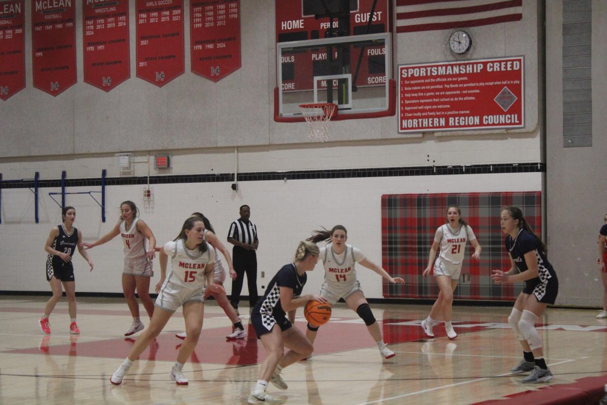 Mclean wing senior Macy Crawford works against Yorktown Generals.