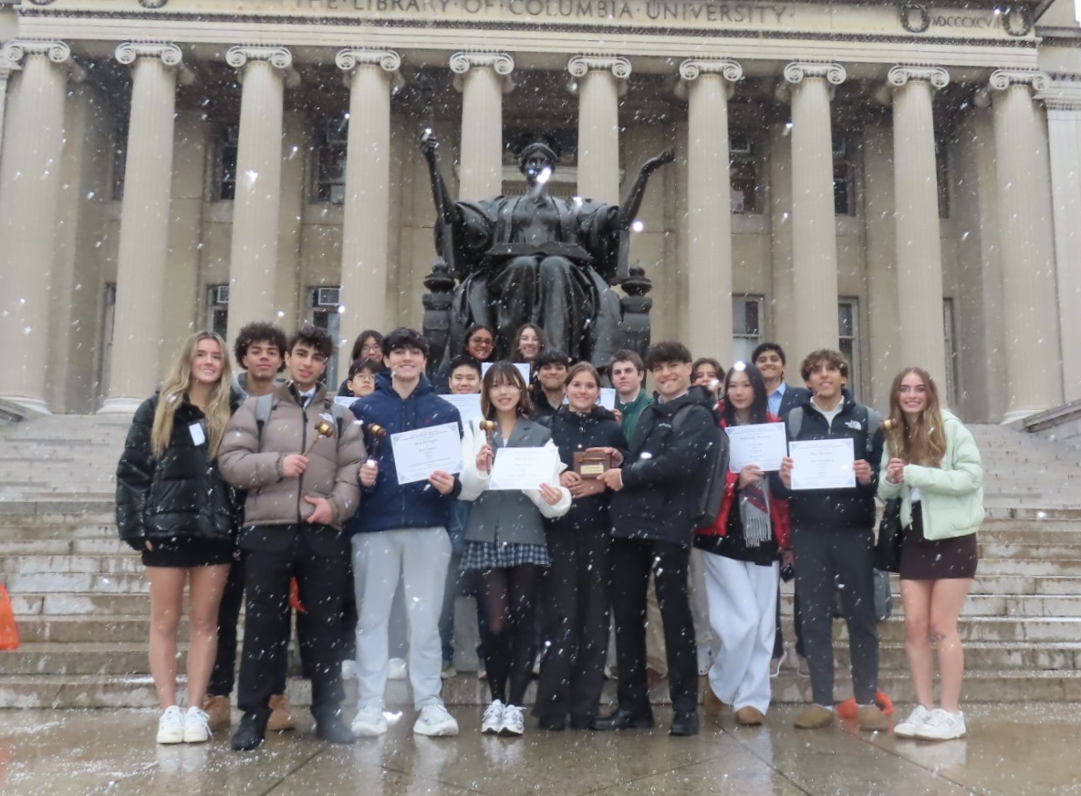 McLean's national Model UN team holds the Best Large Delegation award in front of the Alma Mater statue at Columbia University. CMUNCE marks the second national conference where McLean won a Best Delegation award this year.