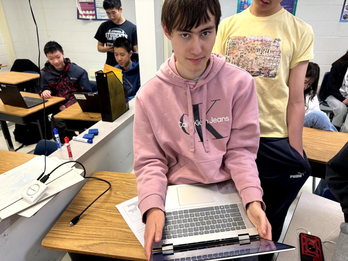 Co-Captain Aiden Feyerherm prepares for a lecture at the beginning of practice. The team has been doing meetings to prepare for the MIT Informatics Tournament.