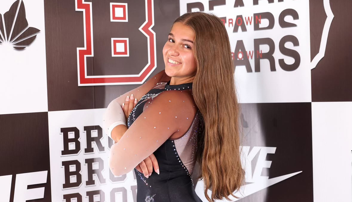 Senior Rehna Saalinger poses at a Brown University media day. Saalinger has committed to the D1 university for gymnastics.