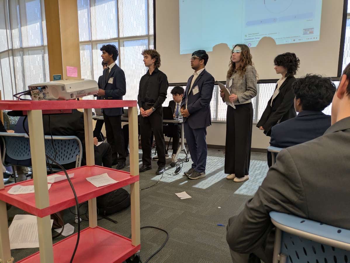 Students at VIMUN present solution to their problem near the end of the committee session.