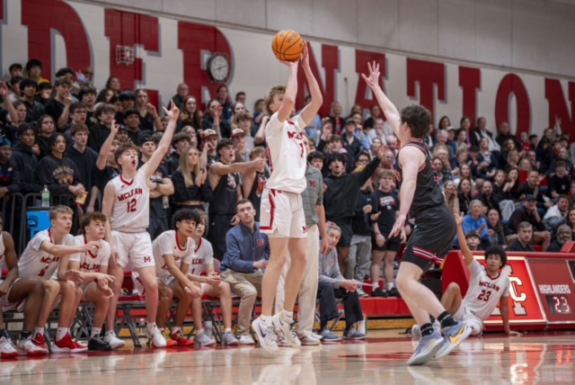 Junior guard Jake Bell hoists a three-point shot. The Highlanders would go on to struggle from the three-point line all night. 