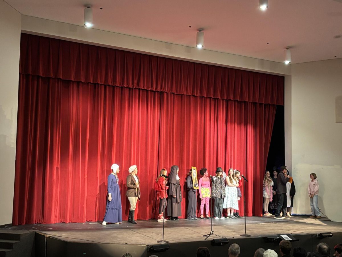 Many brave singers step up to compete in a choir-wide costume contest.