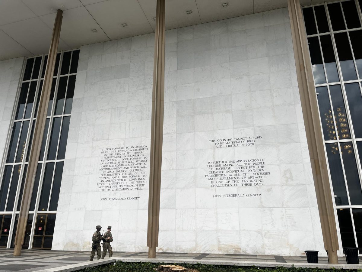 The National Guard in Washington D.C. walk around the Kennedy Center. The Kennedy Center has faced backlash following President Donald Trump's changes. 