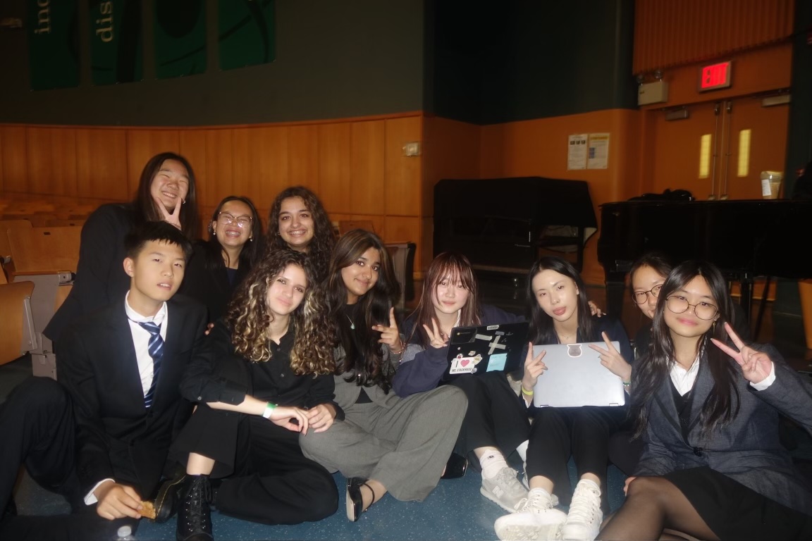 Debate team poses at the New York City Invitational Debate and Speech Tournament. 