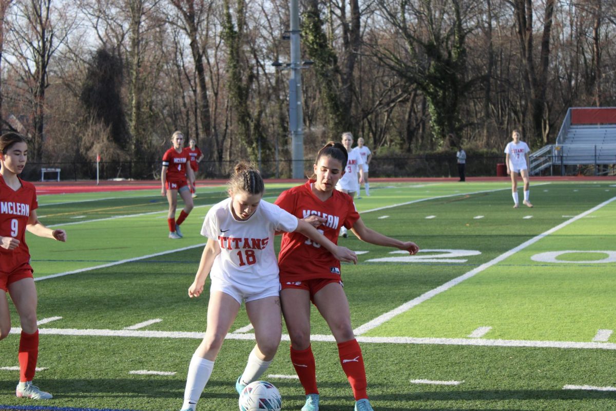 McLean attempts to gain possession of the ball. The team was increasingly aggressive in the second half. 