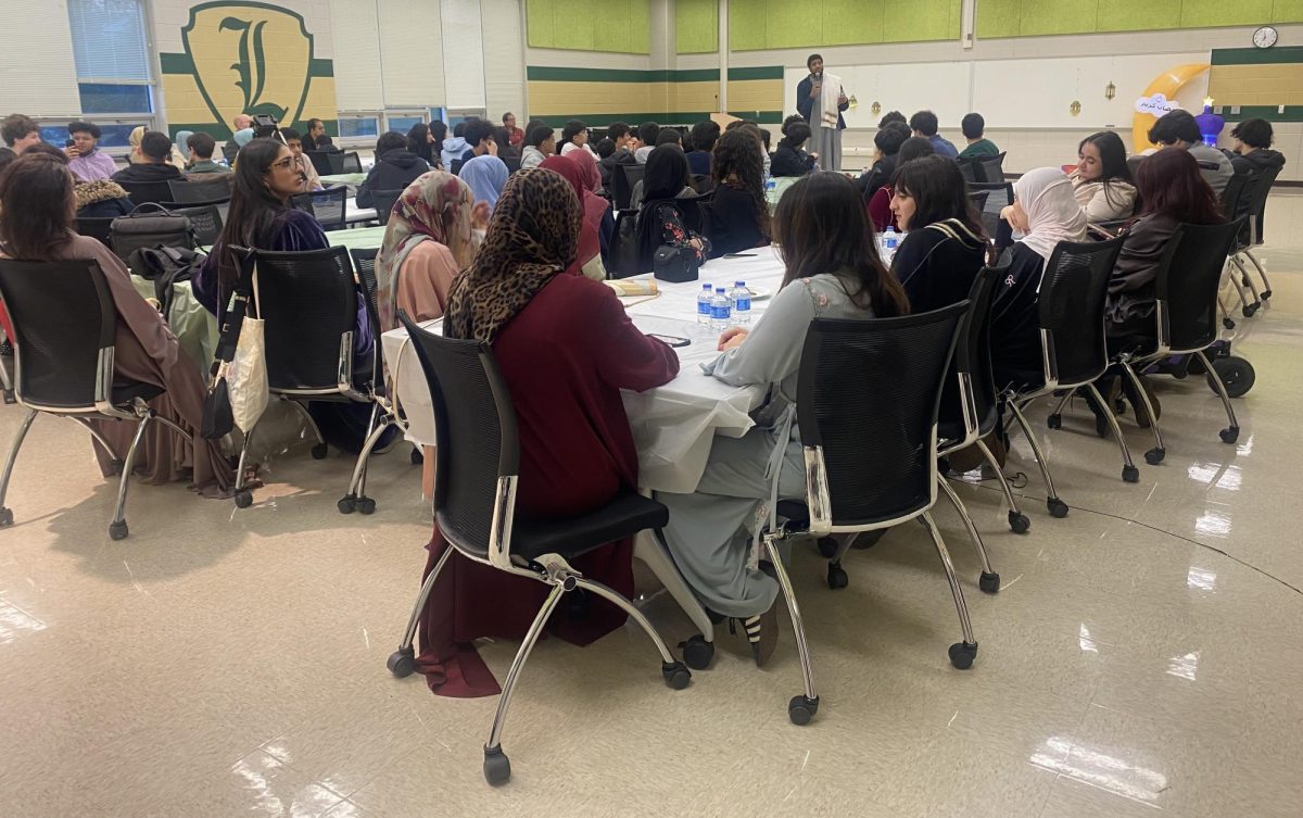 Students listen to the guest speaker, Brother Ali, who talks about how to spend the last days/nights of Ramadan meaningfully.