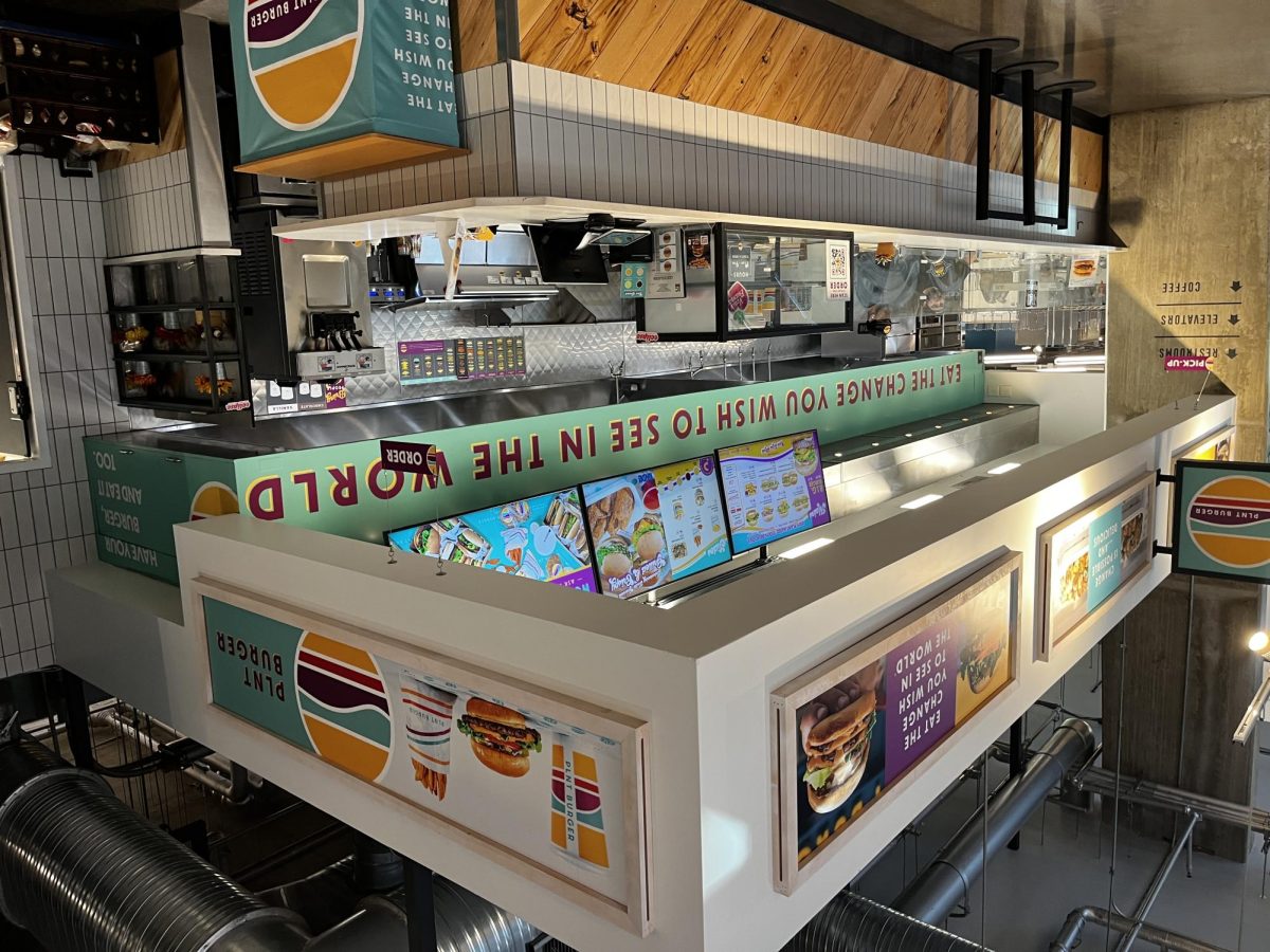 PLNT Burger is placed neatly by the entrance to the Whole Foods Market. The restaurant has options to order there or order online.