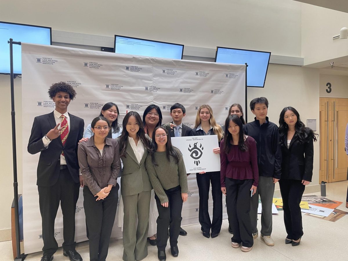 McLean's mock trial team celebrates their fifth place finish at the state championship. This year marked the first time McLean had two teams compete throughout the season. 