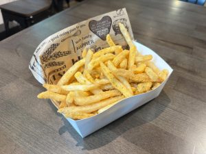The Bburinkle Fries are coated with BHC Chicken’s signature seasoning; however, the texture and overwhelming sweetness make the dish underwhelming.