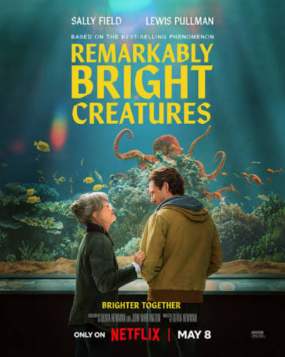 This is the movie poster for Remarkably Bright Creatures. Tova is on the left and Cameron is on the right. The octopus in front of them is Marcellus who they clean the tank for at the local aquarium.  