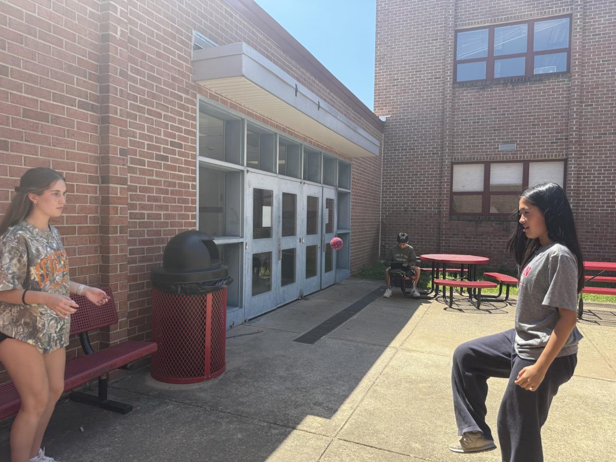 Mai Moriyama and Abbey Sweeney play hacky sack out in the sun at A lunch on May 20. They try to play hacky sack whenever they get the chance, getting off of their phones.