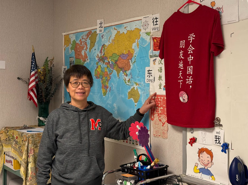 Chinese teacher Kuan-Chen Pearson stands in her classroom. After Chinese was restored on May 8, she has regained her teaching post. 
