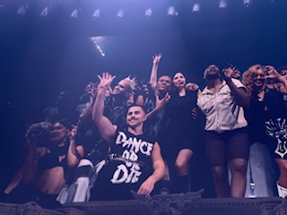 Lady Gaga waves to adoring fans with all of her backup dancers during the final bow.