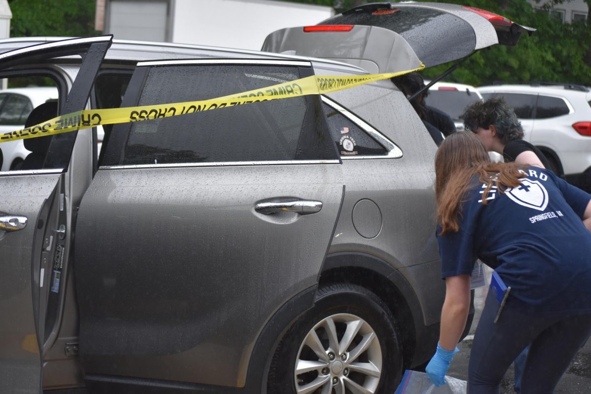 Criminal justice students arriving at the scene of the crash to block off the area and apprehend suspects.