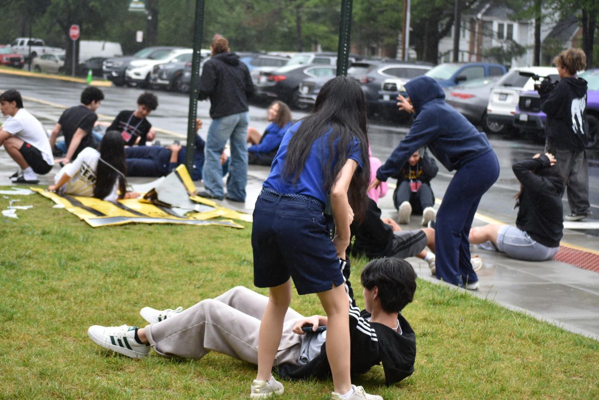 Initial crash site as victims await emergency medical support.