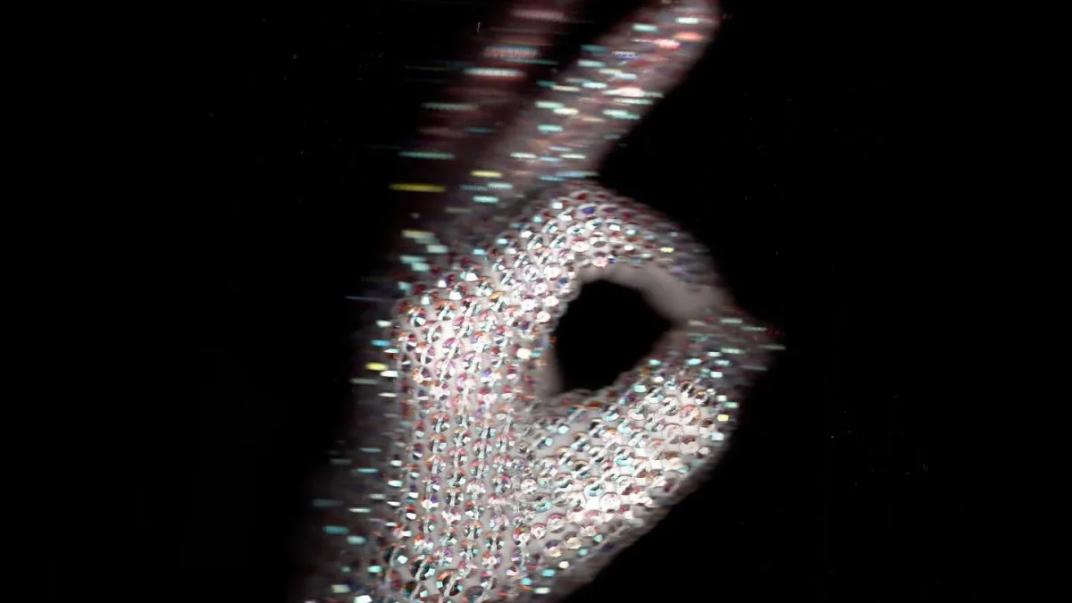 Drake's new album, ICEMAN, was released on May 15. The album cover is a nod to Michael Jackson's signature bedazzled gloves and symbolizes Drake's pursuit of pop dominance. 